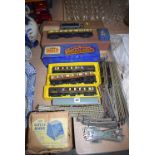 A quantity of railway carriages, made by Hornby, Dublo,