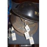 Two Second World War helmets for the North East Marina, each with decal and stamp 'NEM',