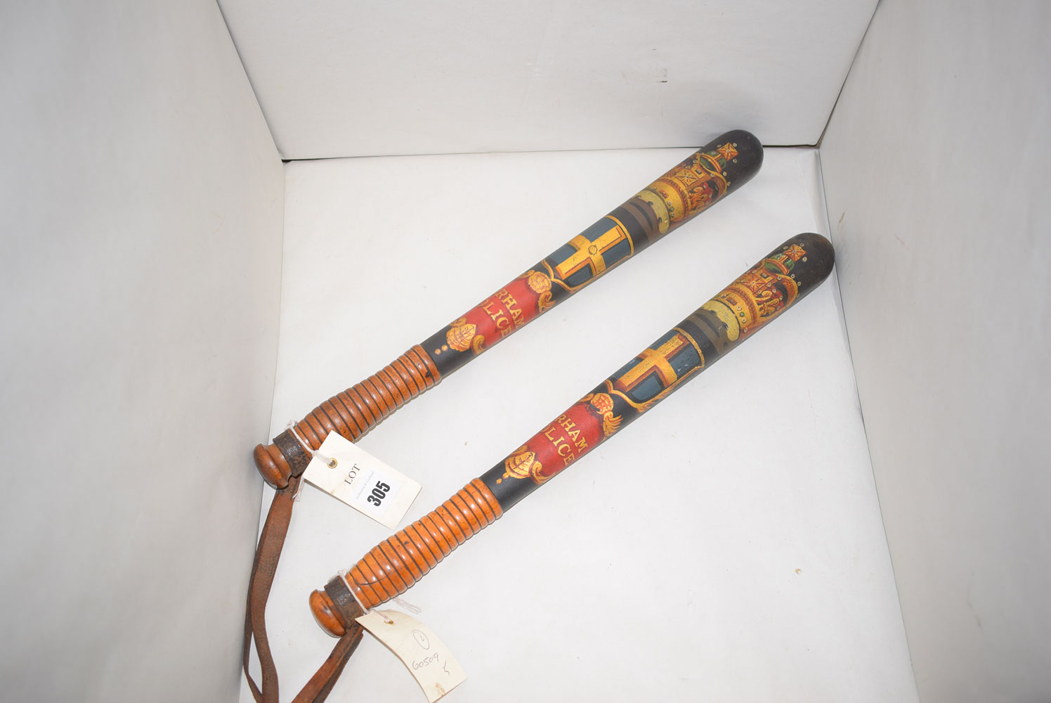 Two Victorian parcel gilt and painted truncheons, by Field, 233 Holborn,