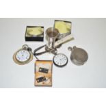 A Ticka camera (parts); a silver cased open faced pocket watch with white enamel roman dial;
