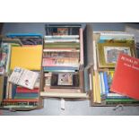 Three boxes of mostly hardback books,