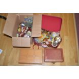 A large quantity of costume jewellery, mainly necklaces; a hair comb; and jewellery boxes.