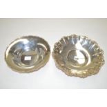 A silver 800 standard Continental circular footed dish decorated with scrolling designs;