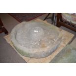 A large circular sandstone pig trough, just over 3ft.