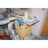 A Scheppach TS2000 electric saw bench; with accessories; and dust extractor tube.