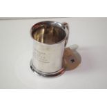 A silver tankard, Birmingham 1935, with engraved inscription.