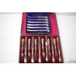 A set of six tea knives and forks,