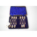 A part set of eleven silver teaspoons by Dixon & Son, Sheffield 1923,