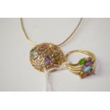 A gemstone set 9ct. yellow gold pendant on chain; together with a gem set ring on 9ct. gold shank.