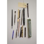 A quantity of pens and pencils, to include an extending propelling pencil by J. Buttler & Co.