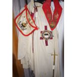 Knights Templar ephemera, to include: two cloaks, miters and caps, collars, an apron,