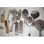 A collection of silver backed dressing table items, including hand brushes, clothes brushes,