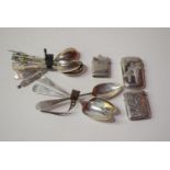 Three silver vesta cases; together with various tea spoons, some with decorative finials.