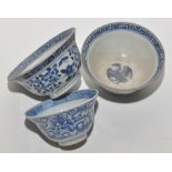 Pair of blue and white bowls, the interiors with cormorant in flight,