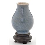 Small blue crackle glaze vase, of Guan-yao type, slight baluster form, height 5.7cm.