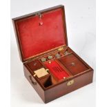 *A 19th Century mahogany work box, the interior with red leather and fittings,