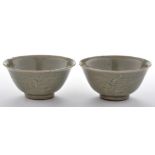 Near pair of Yaozhou celadon type stoneware bowls,