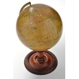 Malby's terestrial globe, 1890, on turned stained wood stand, 37cms (14in.) high.