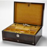 A 19th Century rosewood work-box, of rectangular form with mother-of-peal stringing and roundels,