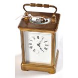 A late 19th Century brass based carriage clock,