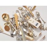 Miscellaneous and plated white metal cutlery, etc., spoons; forks; ladle; tongs; etc.