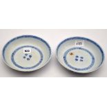 Pair of blue and white 'phoenix' saucer dishes,