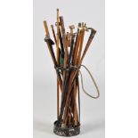 *A collection of walking sticks and parasols,