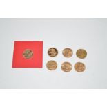 Seven gold sovereigns, dates include: 1911, 1909, 1927, 1913, 1885, 1978 and 1980,