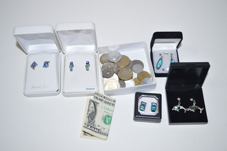 Five pairs of earrings; and a box of coinage.