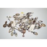 *A large collection of silver teaspoons; a mote spoon; metal tea caddy spoons; etc.