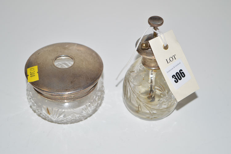 A cut-glass scent bottle with silver cover; and a cut-glass jar with silver cover.