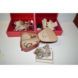 A quantity of costume jewellery, some in wool mounted jewellery boxes.