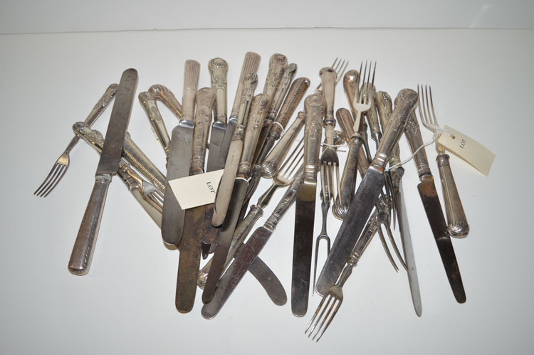 *A quantity of knives and forks, with white metal filled handles, in Kings pattern and pistol grips.