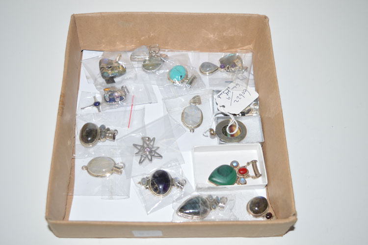 A quantity of gem set pendants, various.