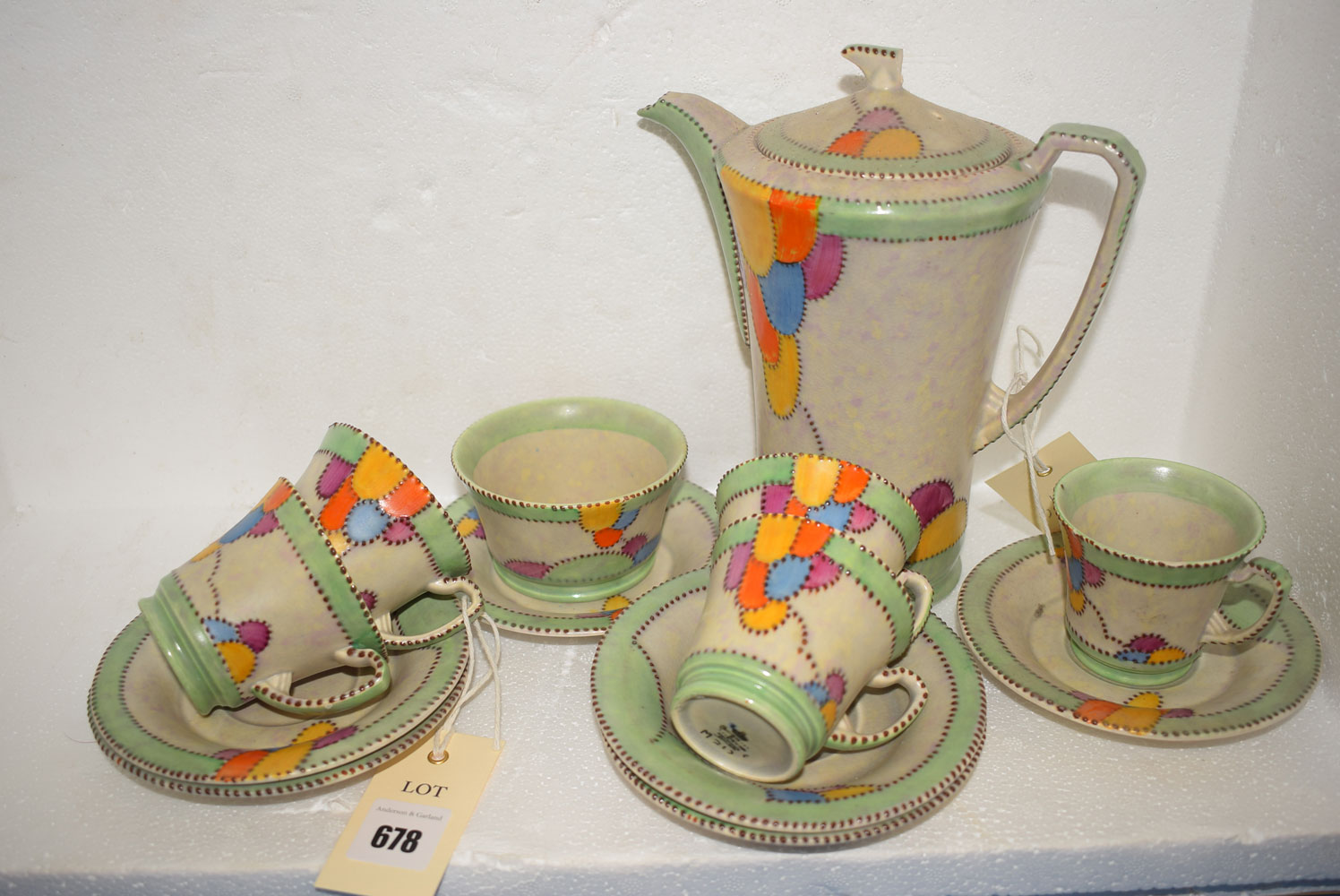 A Crown Devon M213 part coffee set, comprising: five cups and saucers, a sugar bowl,