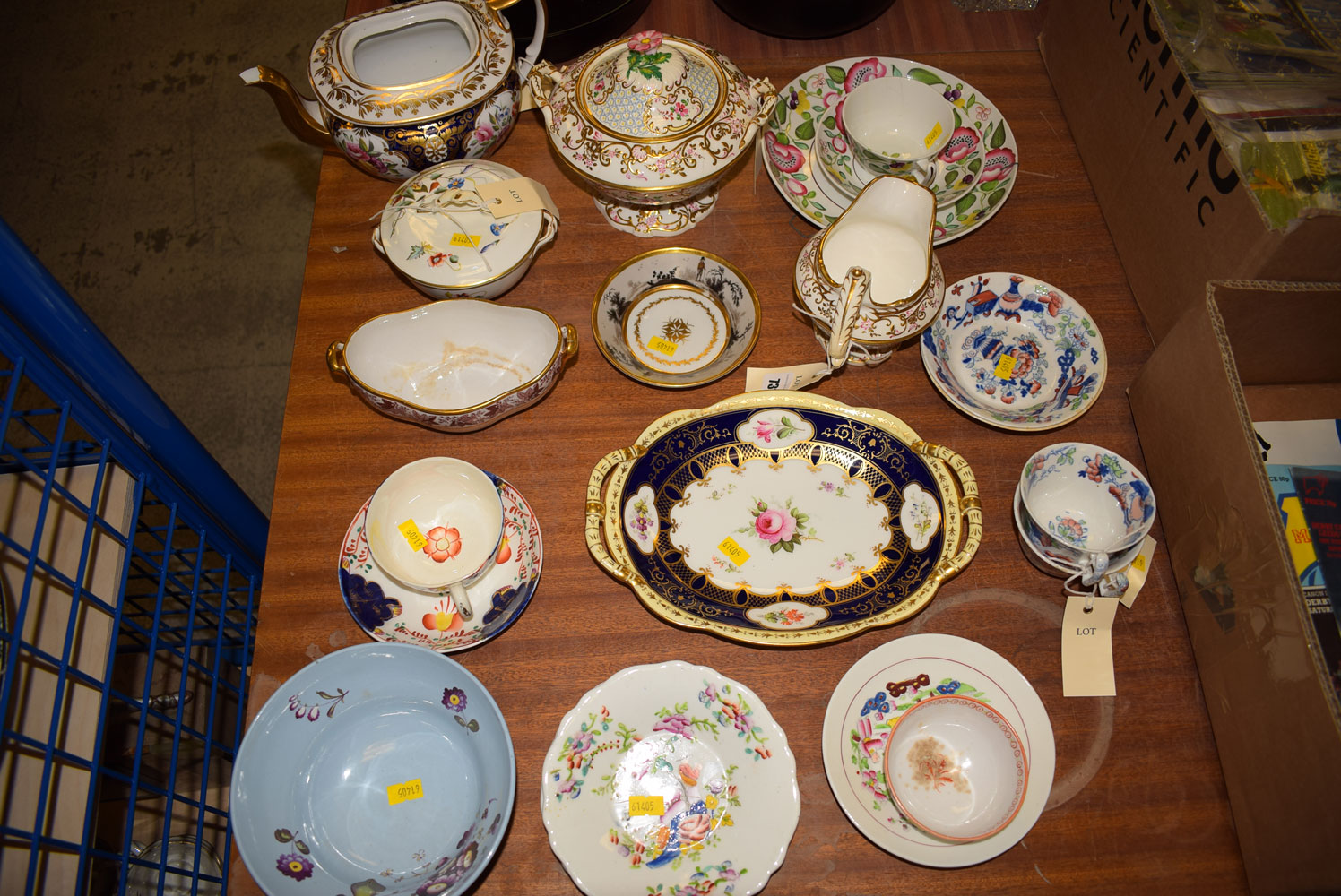 A collection of antique specimen teacups and saucers,