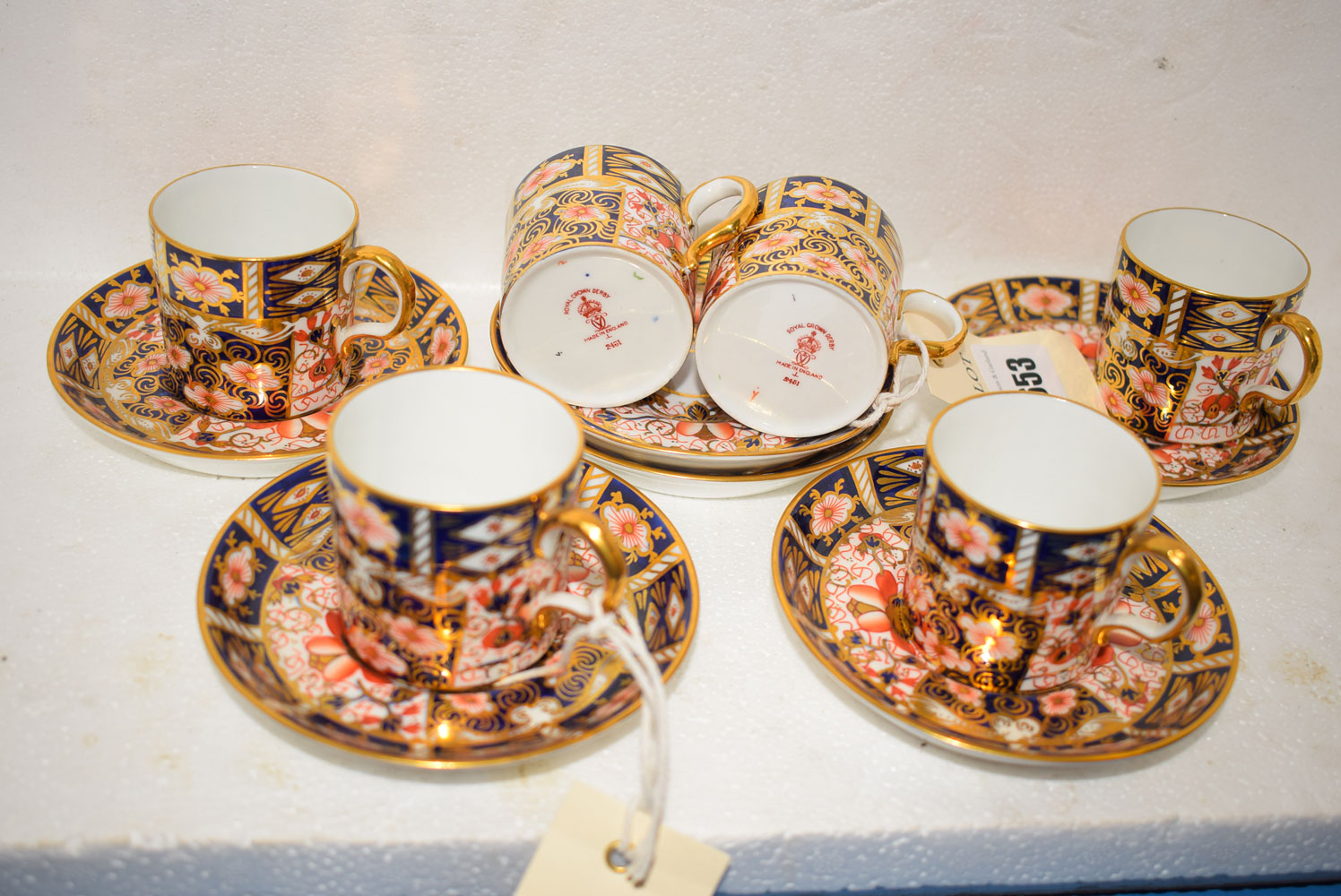 Six Royal Crown Derby coffee cans and saucers in "Old Imari" pattern, no. 2451 to base.