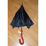 An umbrella in the form of Sylvester McCoy's (7th) Doctor's umbrella.