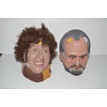 A latex mask of Tom Baker; and The Master.