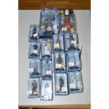 A collection of Doctor Who figurines,