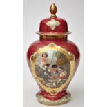 German red ground inverted baluster vase and cover,