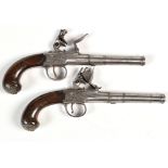 A pair of late 18th Century flintlock pistols, each with 54 bore cannon type barrels, proof marks,