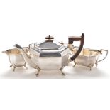 A George V three piece tea service, by Viners, Sheffield 1933, of shaped octagonal form, pad feet,