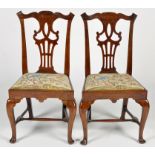 A pair of George III mahogany dining chairs,