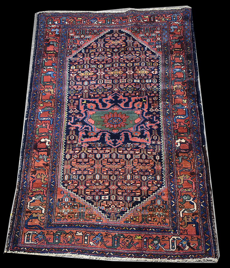 A Toyserkan rug, with geometric designs and central medallion, 186 x 115cms (73 x 45in.).