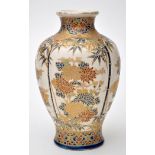 Japanese Satsuma lobed vase, the lobed panels with flower blooms surmounted by bamboo,