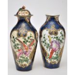Pair of Worcester style scale blue ground vases and single cover,