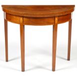 An early 19th Century and later mahogany turnover top card table, with crossbanding to edge,