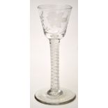 Engraved opaque twist cordial glass, round funnel bowl with single flower issuing from leafy stem,