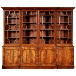 A George III mahogany breakfront bookcase,